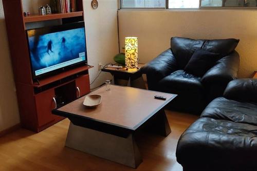 Atpūtas zona naktsmītnē Fully equipped and cozy apartment with parking