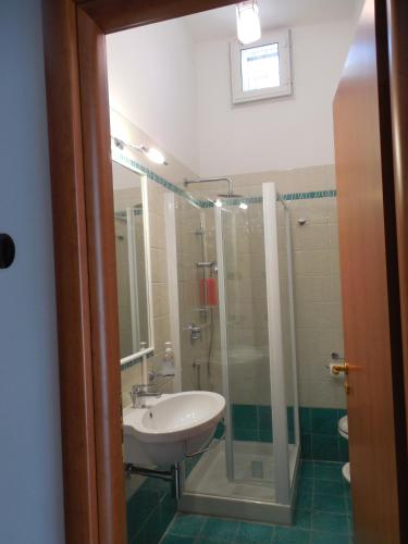 a bathroom with a sink and a shower at Da Zia Pina in Minori