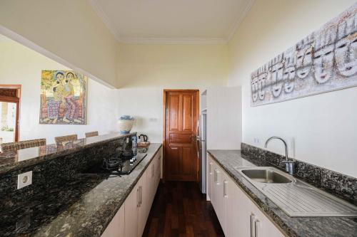 Køkken eller tekøkken på Poinciana Resort