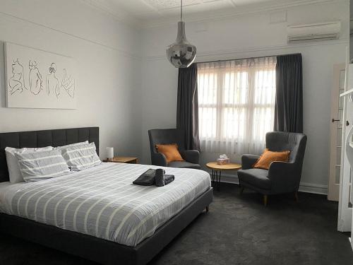 Ένα ή περισσότερα κρεβάτια σε δωμάτιο στο Avon Homestay