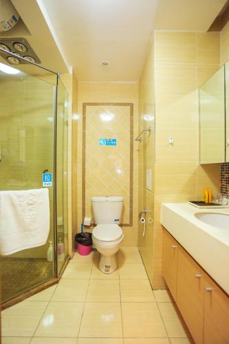 Koupelna v ubytování Dalian Hong Xi Yuan Apartment Wanda Plaza