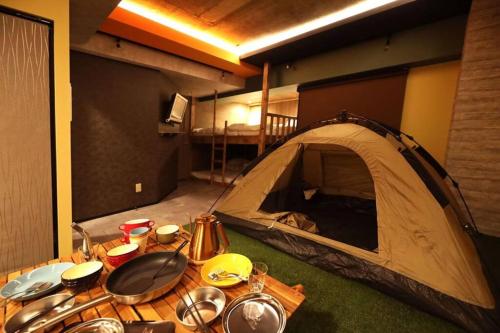 Kép MolinHotels506 アクティビティを満喫できる札幌定山渓 天然温泉付- CampRoom S-Beds6 szállásáról Dzsozankeiben a galériában