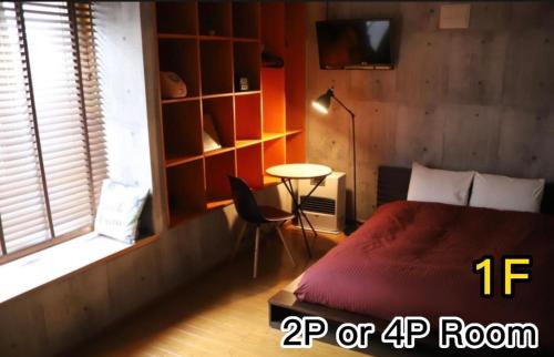 Postel nebo postele na pokoji v ubytování House COCOA