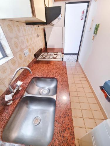 Cucina o angolo cottura di "EL ESTUDIO" Alquiler Temporario de Departamentos