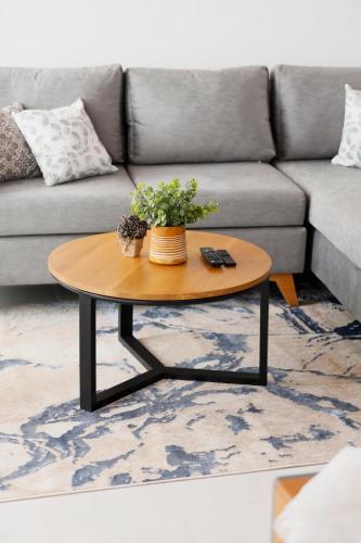 a coffee table in a living room with a couch at The Greens Luxury Boutique Villa in Karagampitiya