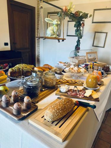 a buffet of food on a table with food at La Tenuta dei Fiori in Ferentillo