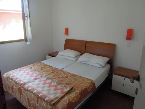 A bed or beds in a room at Cozy seaside flat in the city centre - Beahost