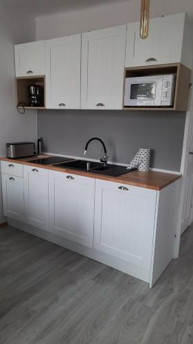 Apartament 3 pokoje z balkonem Asklepios