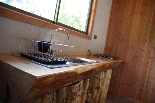 Dapur atau dapur kecil di Cabaña Orilla de Río