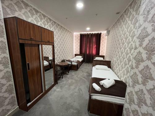 Ένα ή περισσότερα κρεβάτια σε δωμάτιο στο Hotel crystal palace