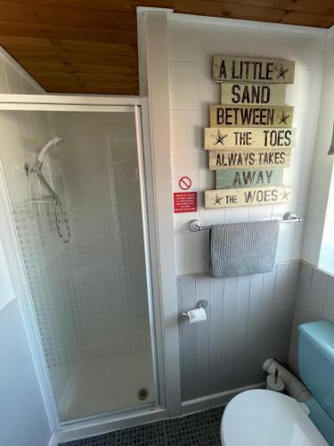 a bathroom with a shower and a toilet at The Sefton Blackpool in Blackpool