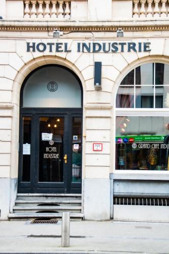 a hotel institute sign on the front of a building at Hotel Industrie in Leuven