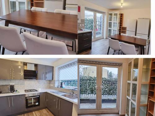 a kitchen with a table and a dining room at holiday home in Manchester