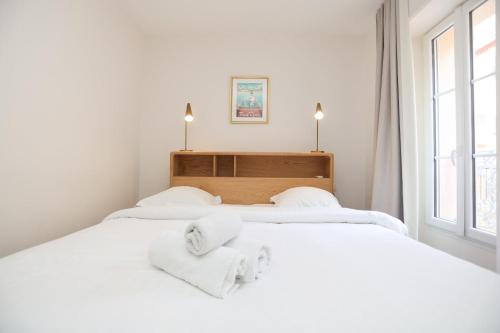 Posteľ alebo postele v izbe v ubytovaní IMMOGROOM - Beautiful and Cosy - Air conditioner - 5 min from beaches