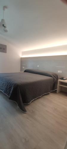 Ένα ή περισσότερα κρεβάτια σε δωμάτιο στο Hotel Losanna Cervia