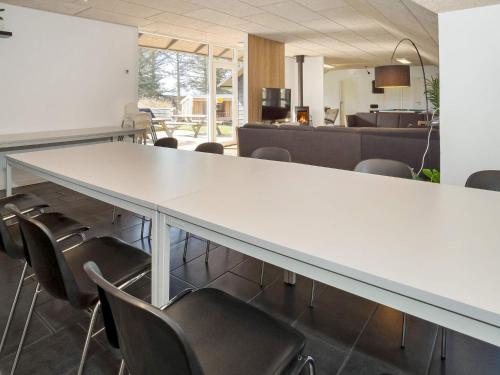 a conference room with a large table and chairs at Luxury Retreat in Vorupor - By Traum Ferienwohnungen in Snedsted