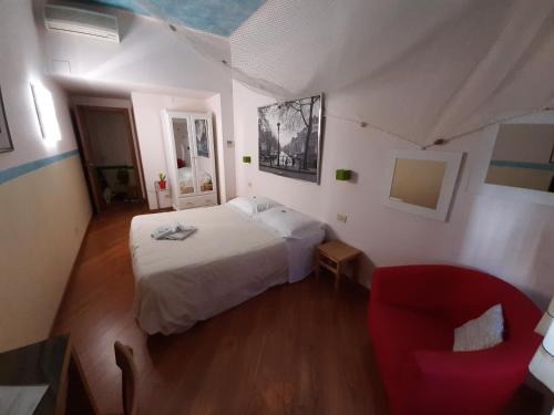 Un ou plusieurs lits dans un hébergement de l'établissement Il Girasole High Quality Inn