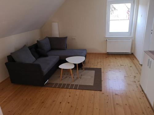 a living room with a couch and a table at Ferienhaus Möller 4 Personen Waldeck Edersee in Waldeck