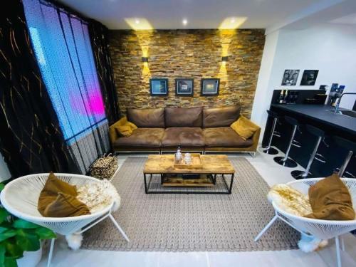 Ein Sitzbereich in der Unterkunft Superbe appartement chic et design