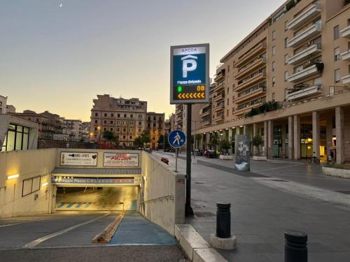 a parking sign on the side of a street at Alba Camere in Palermo