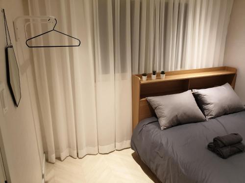 Complace D tesisinde bir odada yatak veya yataklar