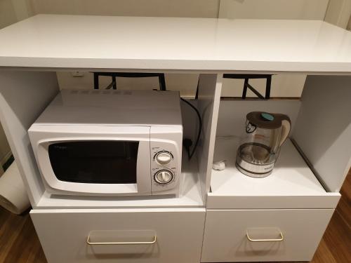 Complace D tesisinde mutfak veya mini mutfak