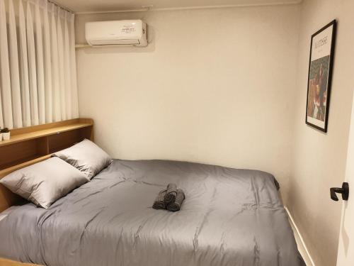 En eller flere senge i et værelse på Complace D