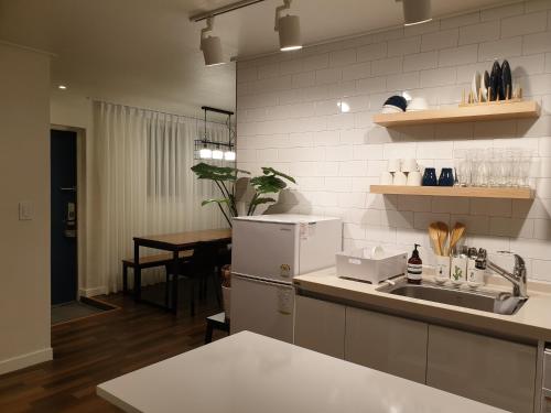 Kuchyň nebo kuchyňský kout v ubytování Complace D