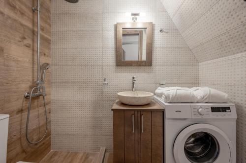 Ванная комната в Nomas Home Skaloti