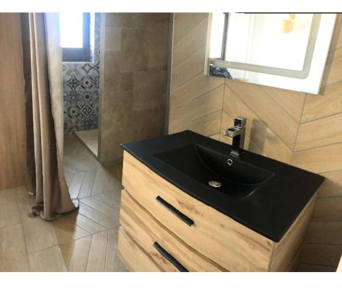 Phòng tắm tại Appartement sur l île de cavallo