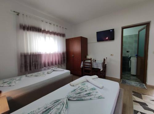 Postel nebo postele na pokoji v ubytování Dona's Studio Apartment