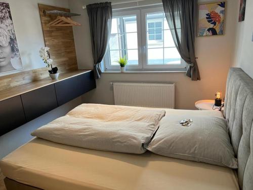 Postel nebo postele na pokoji v ubytování Apartmenthaus Wagner