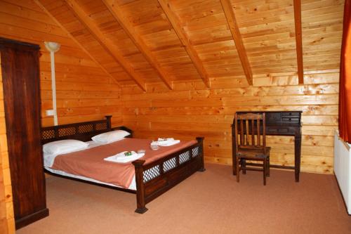 Lova arba lovos apgyvendinimo įstaigoje Pasithea Mountain Chalet