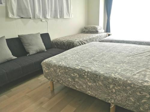 Ліжко або ліжка в номері B House -- Self Check in -- Room Number & Password is in the following email