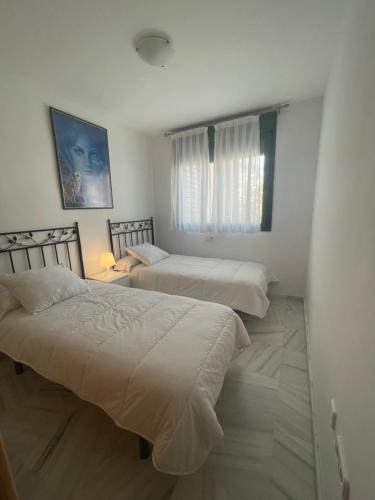 Легло или легла в стая в Apartamento en Nerja con vistas al Mar.