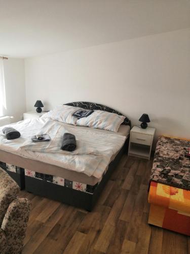 En eller flere senge i et værelse på Ubytování v RV