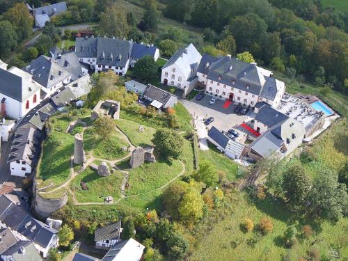 an aerial view of a small village with houses at Burghaus & Villa Kronenburg in Kronenburg