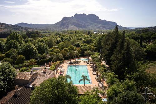 an overhead view of a pool with mountains in the background at Glamping Côte d'Azur in Roquebrune-sur-Argens