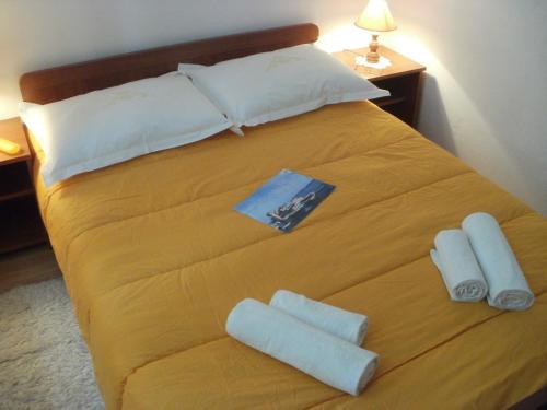 Krevet ili kreveti u jedinici u okviru objekta Grgin Apartments