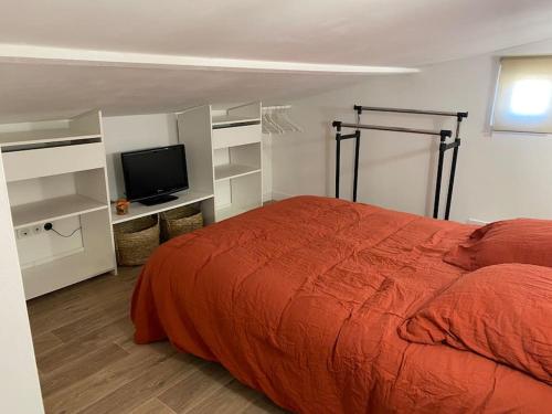 Posteľ alebo postele v izbe v ubytovaní Maisonnette entre ville et campagne