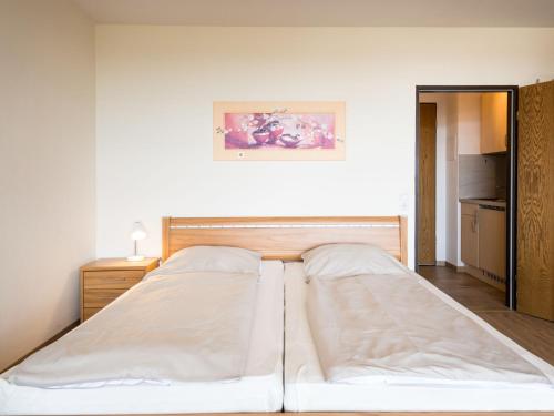 Cama o camas de una habitación en Apartment B906 by Interhome