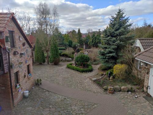 Φωτογραφία από το άλμπουμ του Siedem Ogrodów - Pokoje w Domku Kucharza σε Łowicz Wałecki