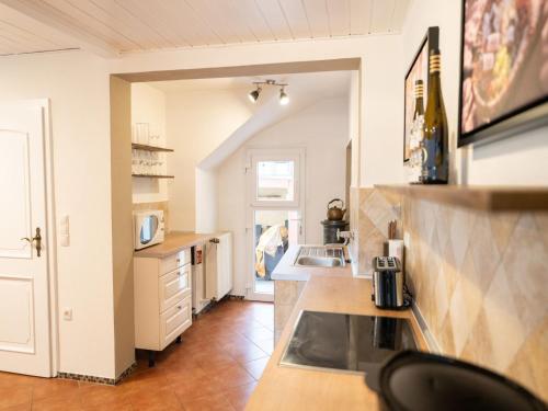 Kuchyň nebo kuchyňský kout v ubytování Holiday Home Jula by Interhome
