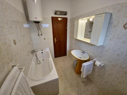 Kúpeľňa v ubytovaní Apartments Cacija