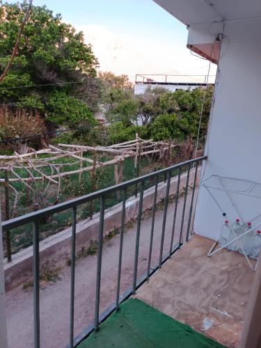a balcony with a view of a road at Huerto El Tránsito in El Portillo