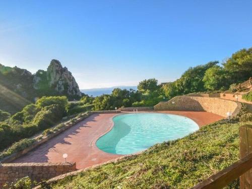 Terraced house with communal pool Costa Paradiso