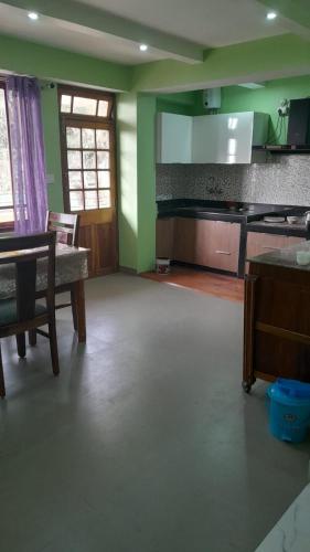 Kuchyň nebo kuchyňský kout v ubytování Parichay Homestay