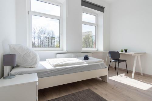 Postel nebo postele na pokoji v ubytování Komfortable Monteursunterkunft: 4-Zimmer-Wohnung mit getrennten Betten
