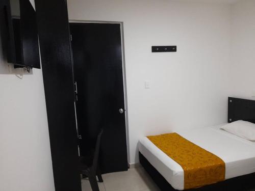 Postel nebo postele na pokoji v ubytování Hotel Diamonds