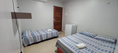 - une chambre d'hôtel avec 2 lits dans l'établissement A.N Hotel, à Boa Vista